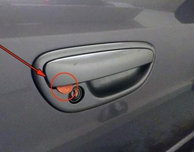 moneda robo automovil
